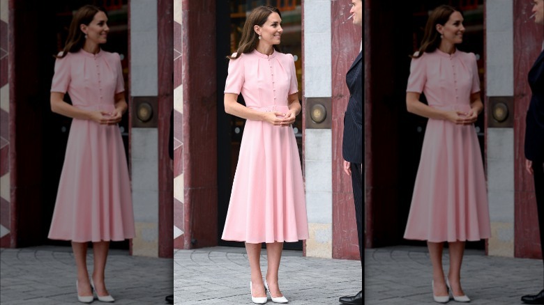 Kate Middleton in pink dress and white pumps