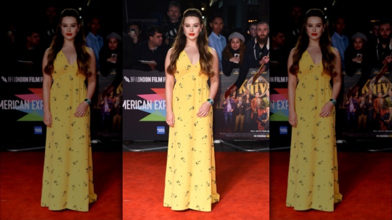 Katherine Langford wearing a yellow dress