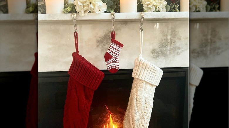 Three stockings on fireplace