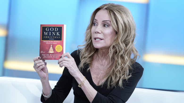 Kathie Lee Gifford holding Godwink book