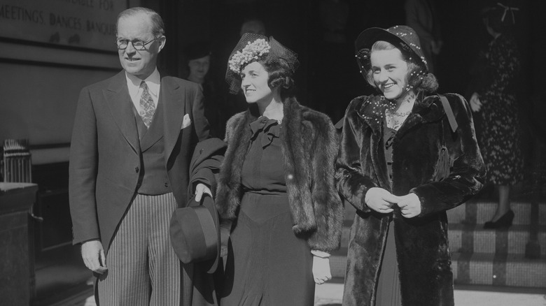 Kathleen Kennedy smiling with her parents