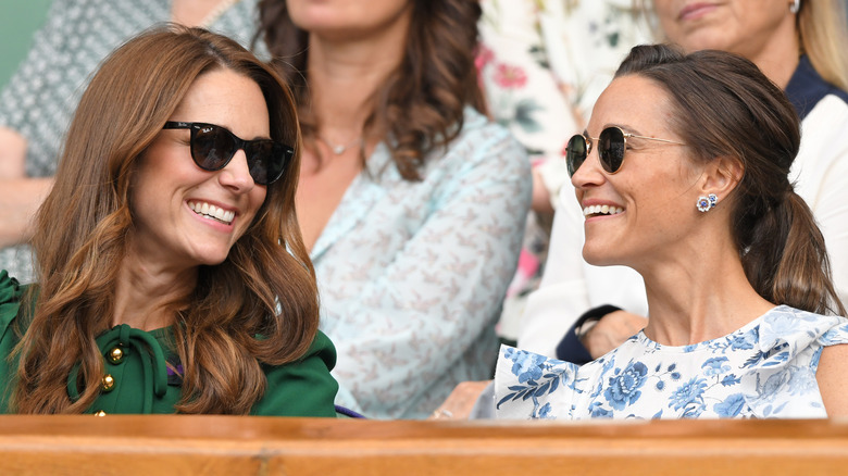 Kate and Pippa Middleton smiling