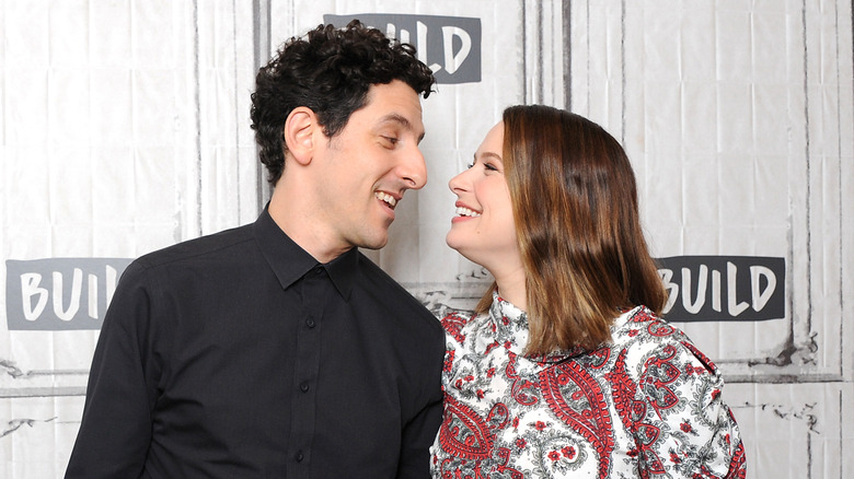 Katie Lowes smiling at her husband Adam Shapiro