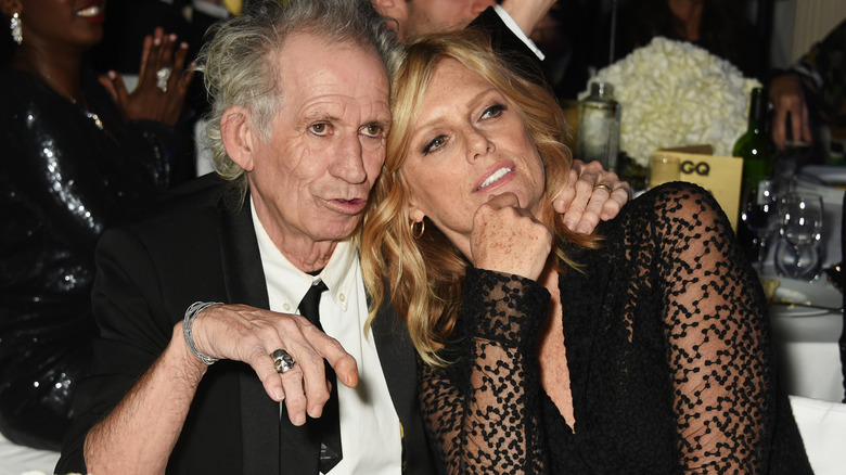 Keith Richards wraps arm around Patti Hansen