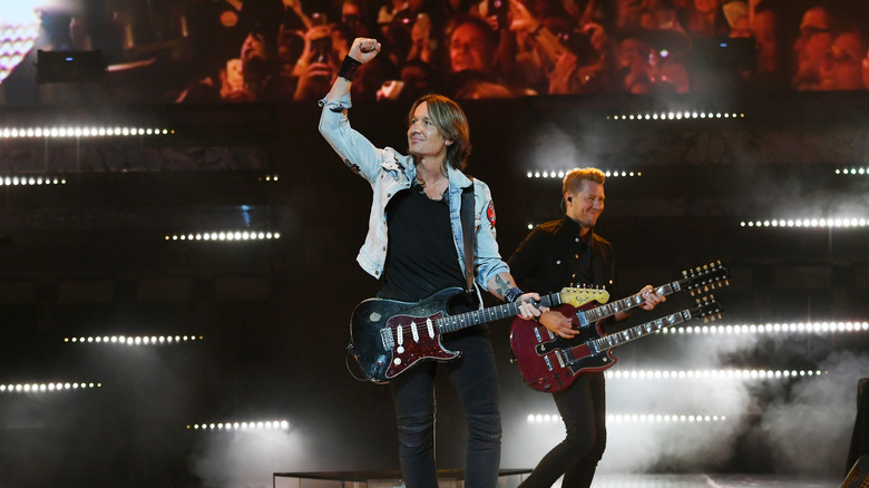 Keith Urban playing guitar