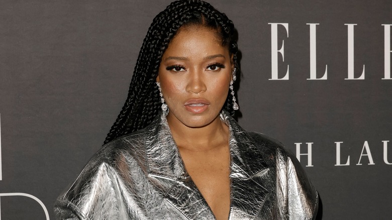 Keke Palmer posing in silver