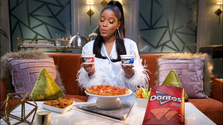 Keke Palmer holding Doritos Dips