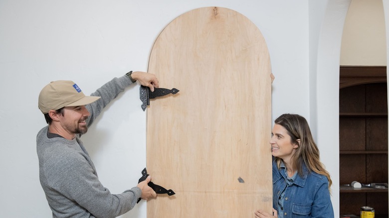 Kele and Christina with door