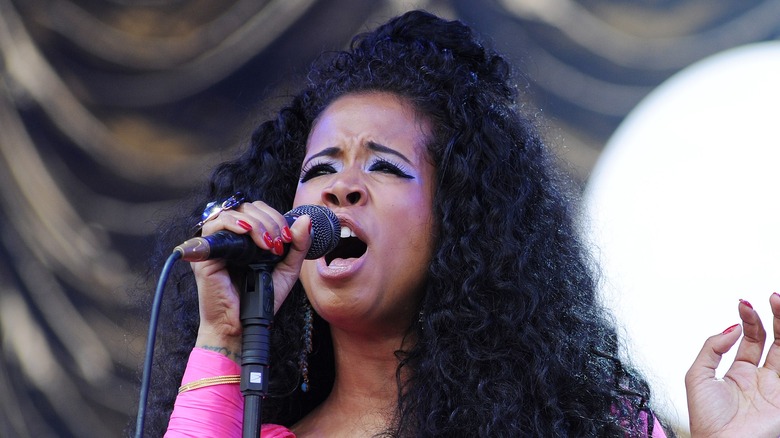 Kelis singing onstage