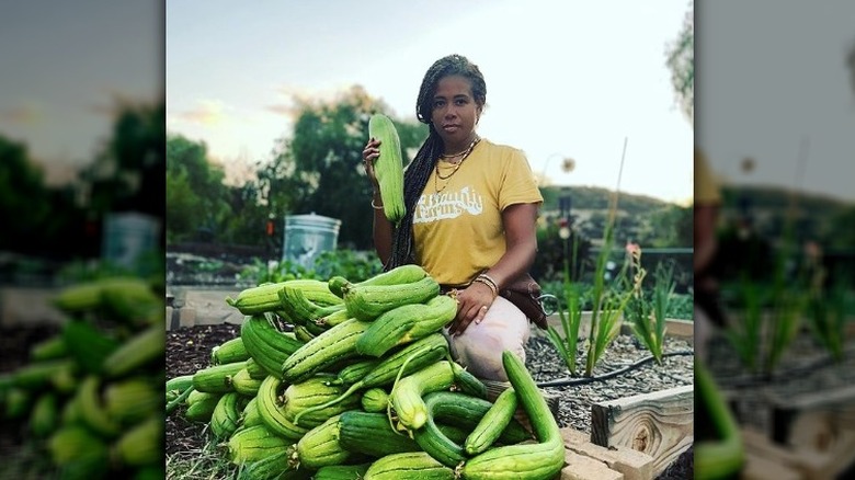 Kelis posing with her crops