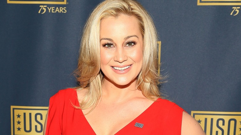 Kellie Pickler on a USO step and repeat