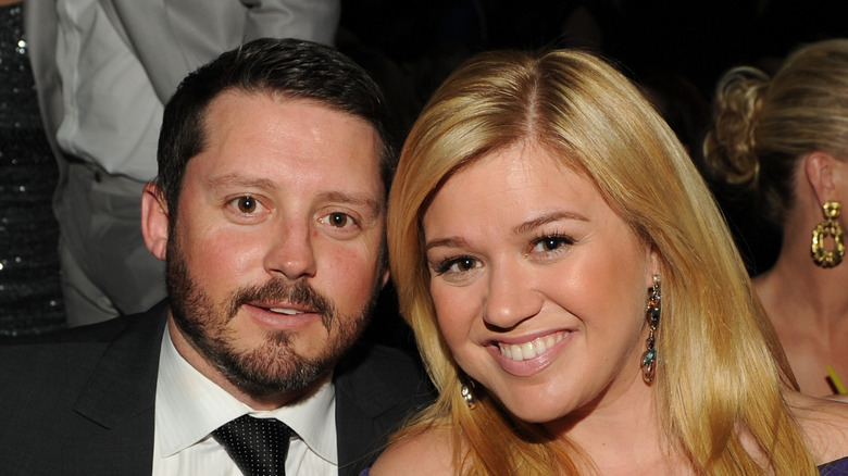 Kelly Clarkson and Brandon Blackstock at an event.