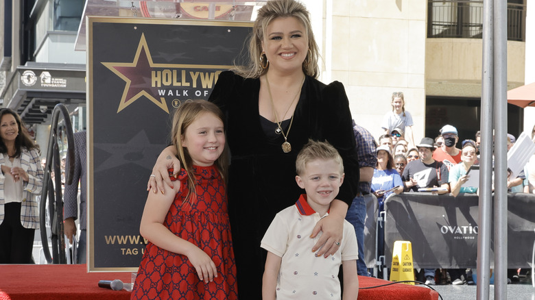 Kelly Clarkson with her kids, River Blackstock and Remy Blackstock, on the Hollywood Walk of Fame