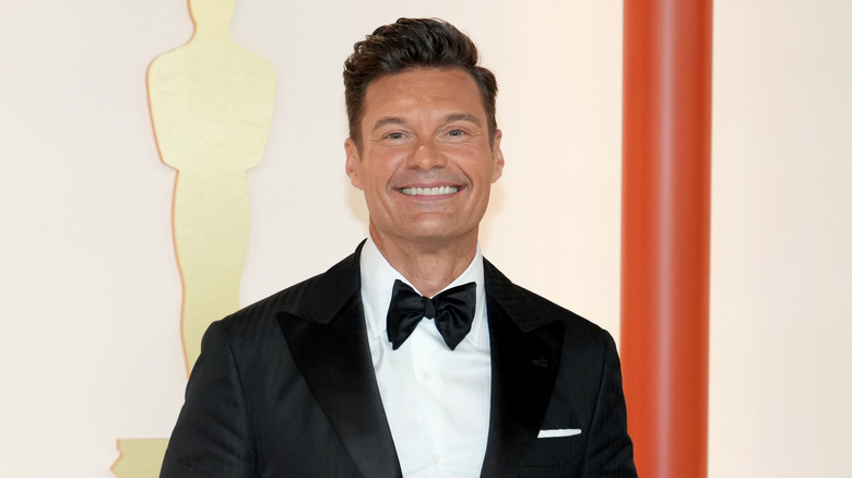 Ryan Seacrest poses at the Oscars 2023