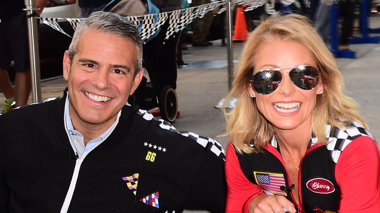 Andy Cohen and Kelly Ripa smiling