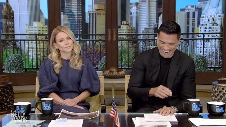 Kelly Ripa and Mark Consuelos on set