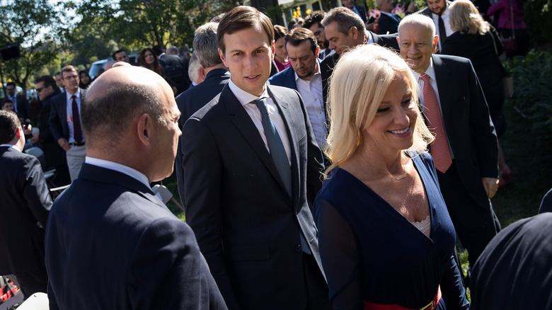 Jared Kushner and Kellyanne Conway walking