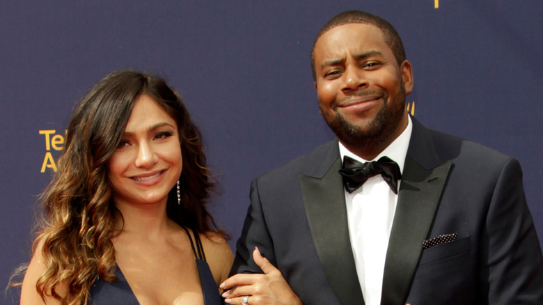 Kenan Thompson and his wife smiling 