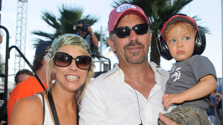 Christine Baumgartner, Kevin Costner, and son