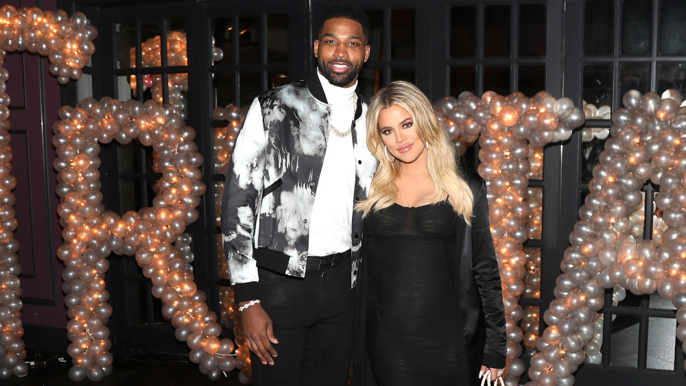 Khloé Kardashian and Tristan Thompson pose together