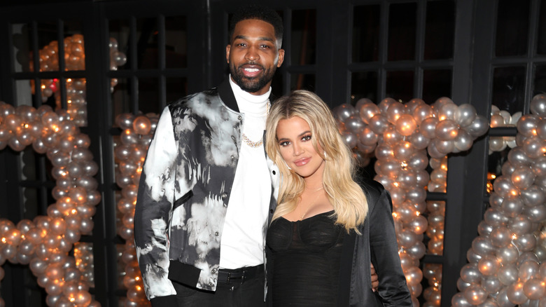 Tristan Thompson and Khloé Kardashian posing