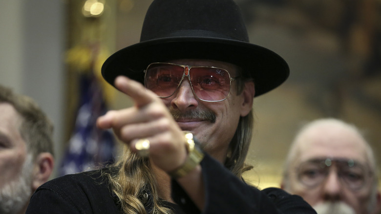 Kid Rock pointing at political event