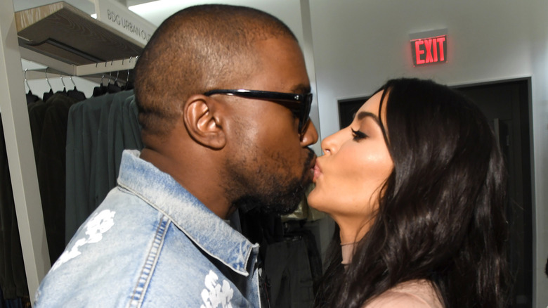 Kim Kardashian and Kanye West kissing