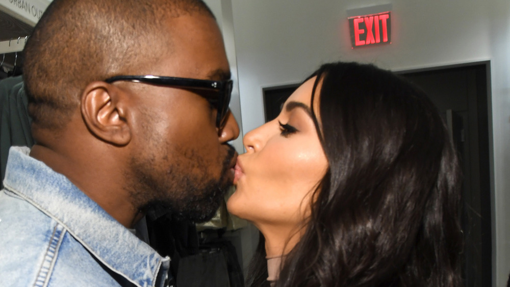 Kim Kardashian kisses Kanye West in happier times