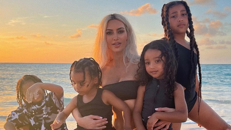 Kim Kardashian at beach with her kids