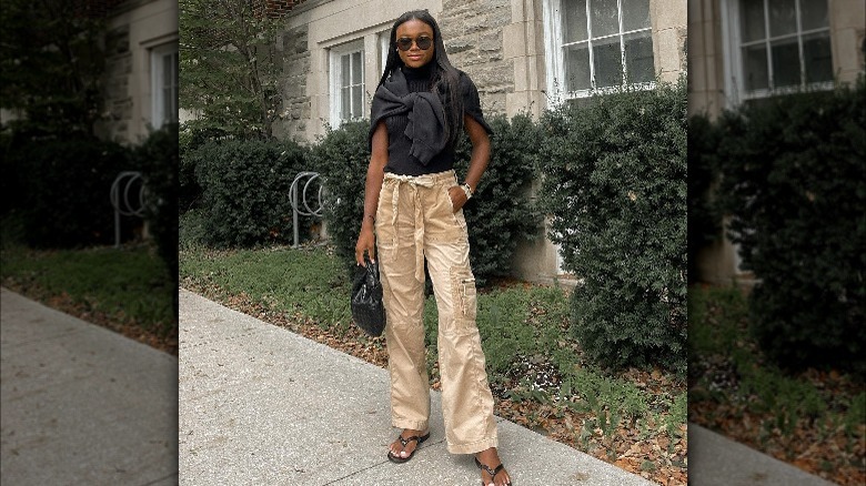 Woman in cargo pants and sweater