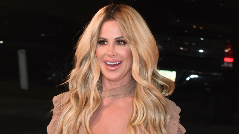 Kim Zolciak-Biermann walking outside