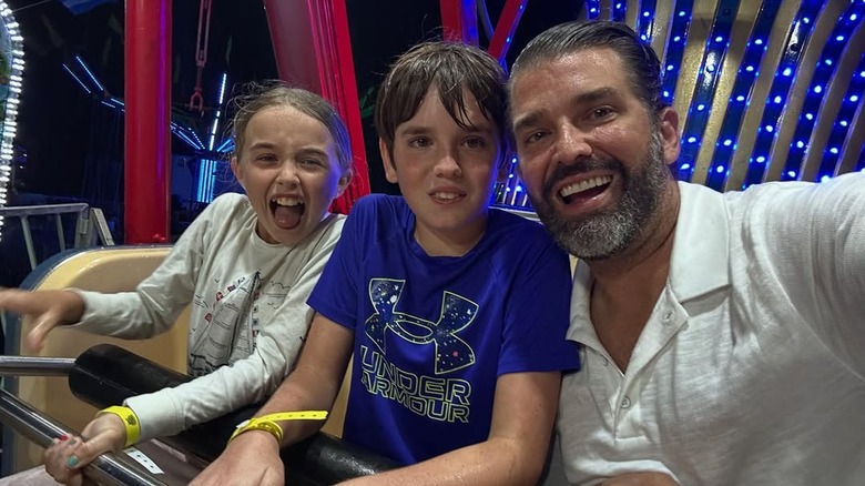 Donald Trump Jr. and children on carnival ride