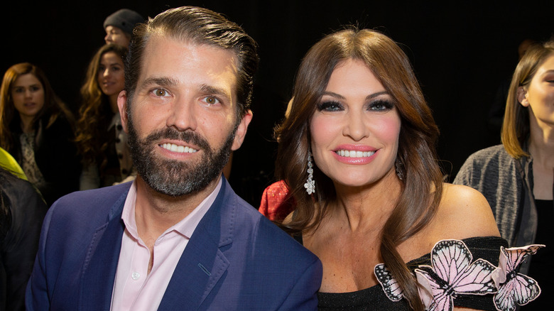 Donald Trump Jr. and Kimberly Guilfoyle smiling