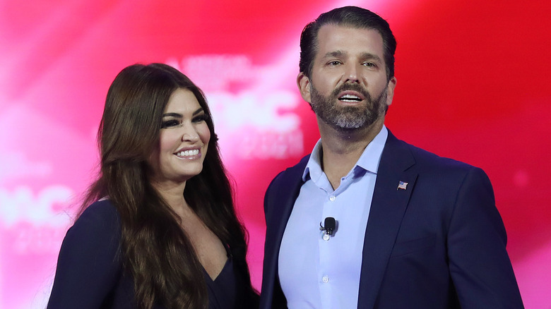 Kimberly Guilfoyle and Donald Trump Jr. on stage