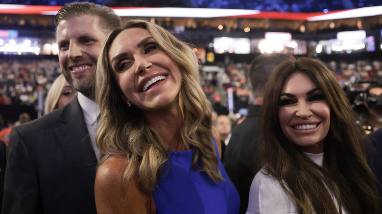 Eric Trump, Lara Trump,a nd Kimberly Guilfoyle smiling