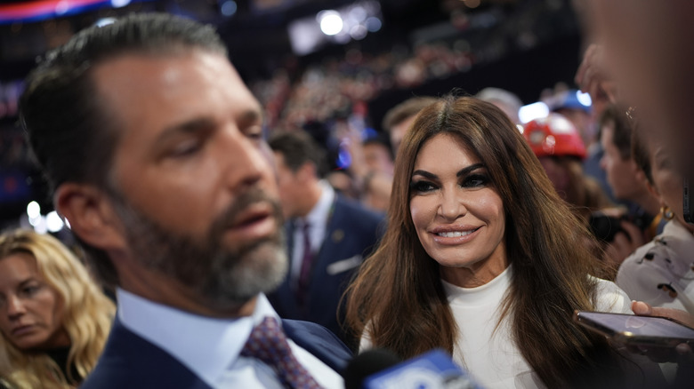 Kimberly Guilfoyle looks lovingly at Donald Trump Jr.