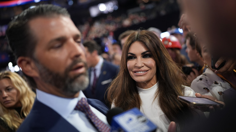 Kimberly Guilfoyle smiling at Donald Trump Jr.