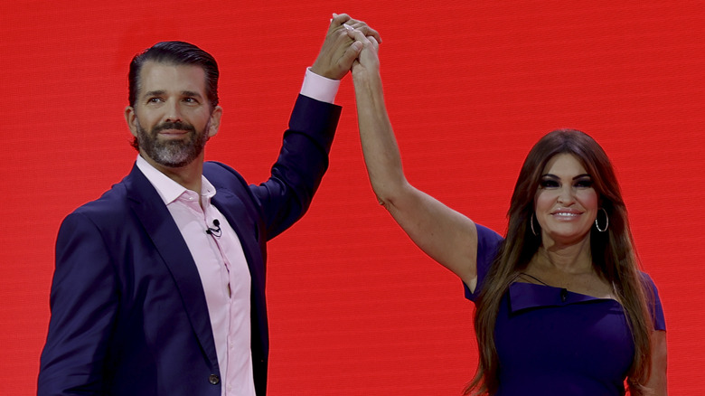 Donald Trump Jr. and Kimberly Guilfoyle high-fiving