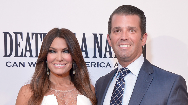 Kimberly Guilfoyle and Donald Trump Jr. smiling