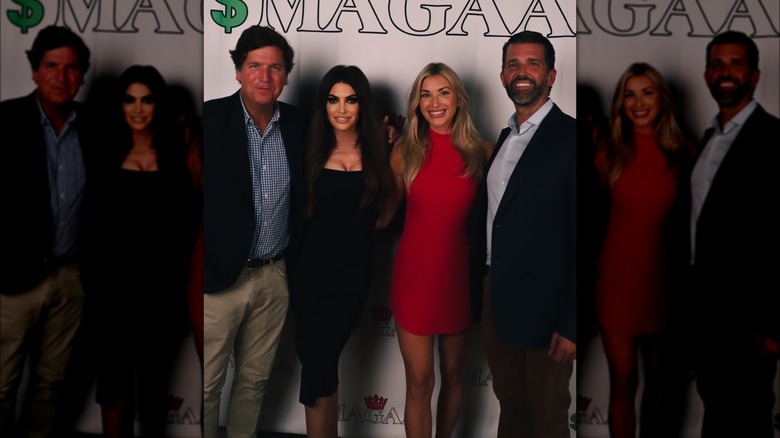 Tucker Carlson, Kimberly Guilfoyle, Camryn Kinsey, and Donald Trump Jr. posing at Bitcoin conference