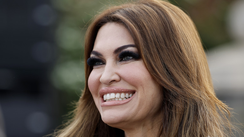 Kimberly Guilfoyle smiling at Trump National Golf Club