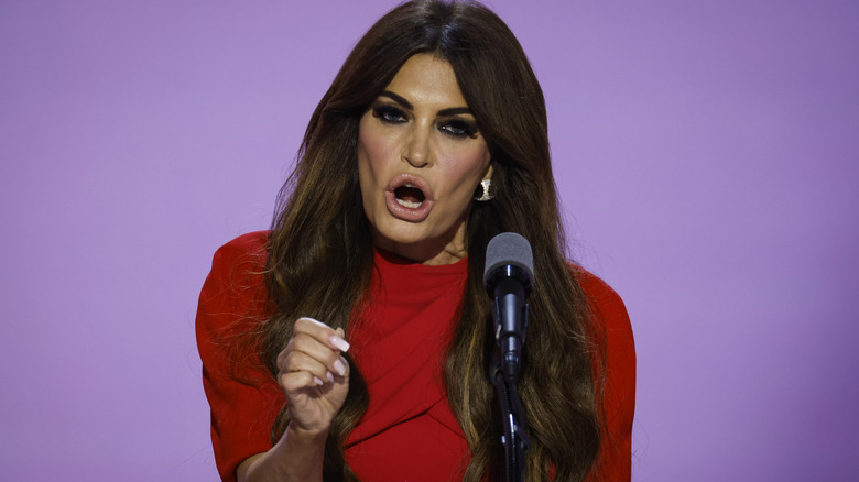 Kimberly Guilfoyle speaking at podium mouth open