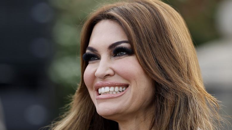 Kimberly Guilfoyle smiling at the Trump National Golf Club