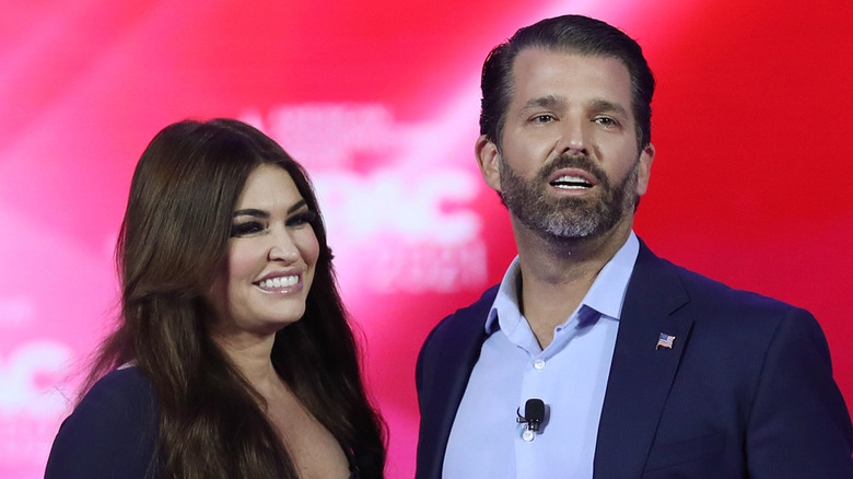 Kimberly Guilfoyle and Donald Trump Jr. smiling