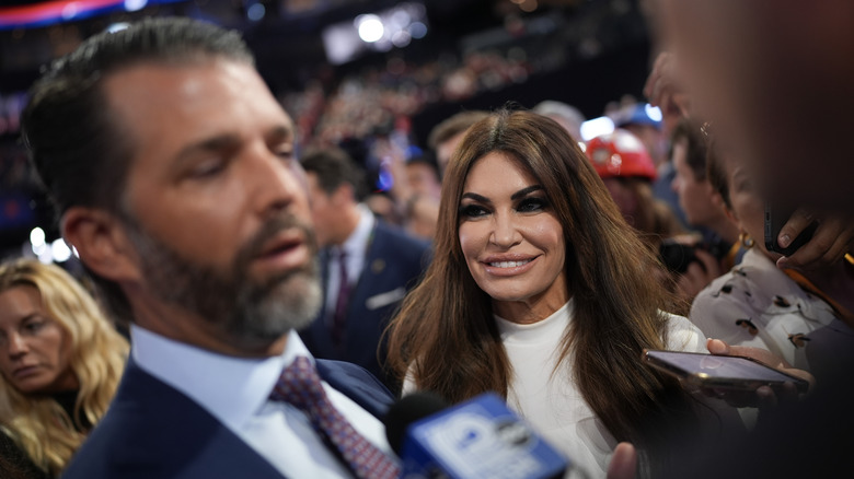 Kimberly Guilfoyle smiling at Donald Trump Jr.