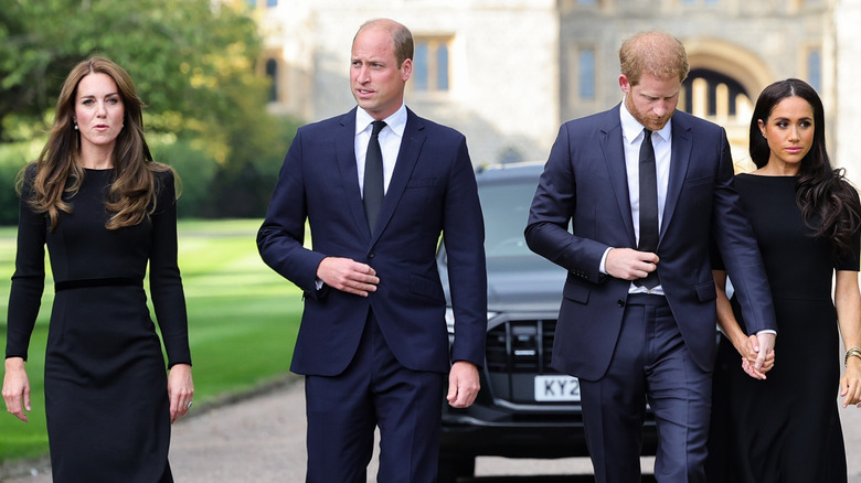 Kate, William, Harry, and Meghan walking together