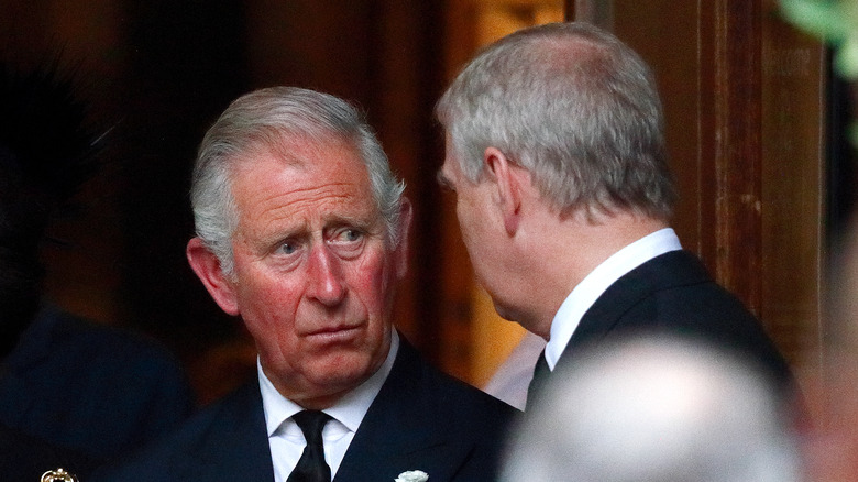 King charles looking at prince andrew