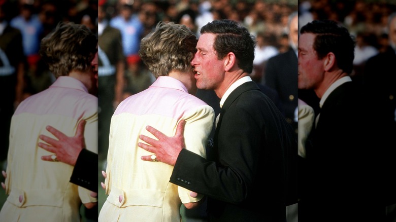 Prince Charles embracing Princess Diana