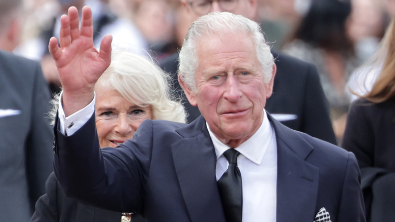 King Charles III waving