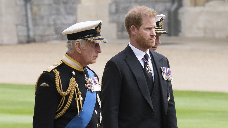 King Charles and Prince Harry looking to side
